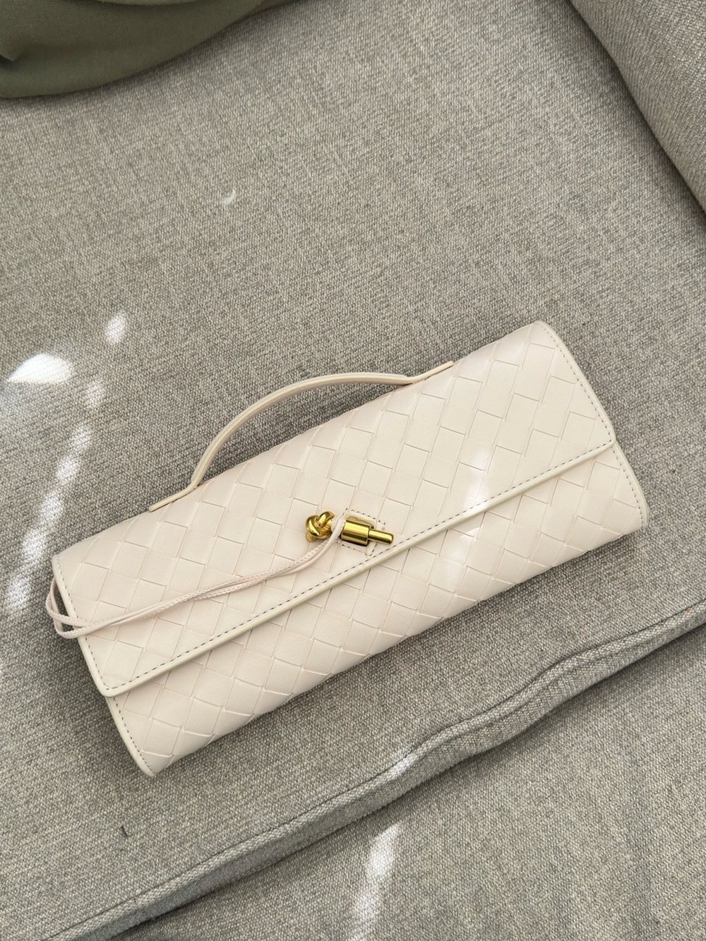 Cream Woven Leather Clutch with Gold Knot Accent